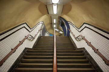 Staircase up to a passage at Camden Town underground station in London - obrazy, fototapety, plakaty