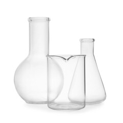 Set of laboratory glassware on white background