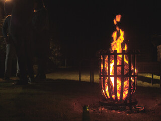 burning candle in the fireplace