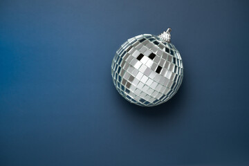 disco ball on dark blue background . night sky concept , retro nightclub minimalistic banner for a fun party
