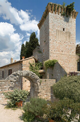 Spello, Perugia. Arco di Augusto con torre medievale