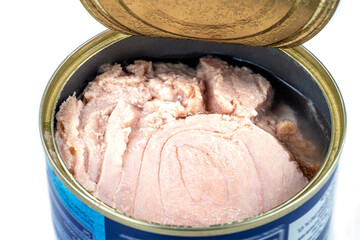 Open can of tuna fish and ready for salad