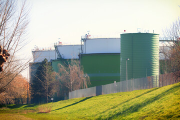 Fuel tank, tanks for gasoline and oil in fuel tank farm in petroleum refinery in open air above...