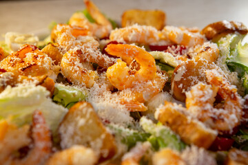 salad with seafood, herbs and parmesan