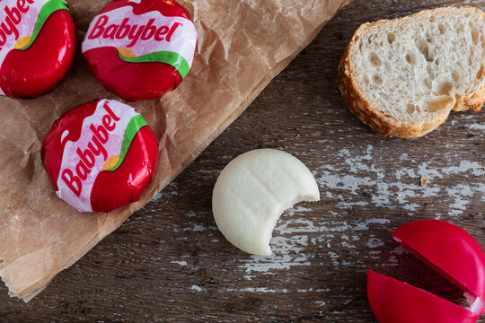 babybel cheese snack on rustic background