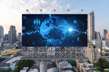 World planet Earth map hologram of social media icons over sunset panoramic cityscape of Bangkok, Southeast Asia. The concept of people connections.