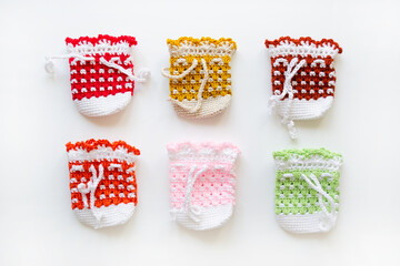 Knitted colored bags. Easter egg sacks. Handmade