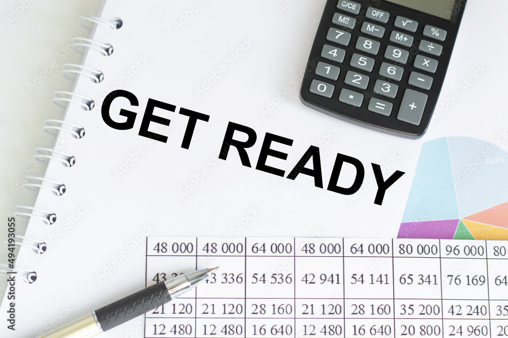 Aufkleber notebook with get ready word with office tools on white table. business conceptual