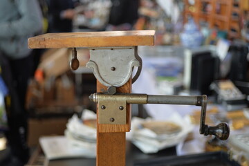 An old, wooden tripod for a plate camera on a flea market in Berlin-City.