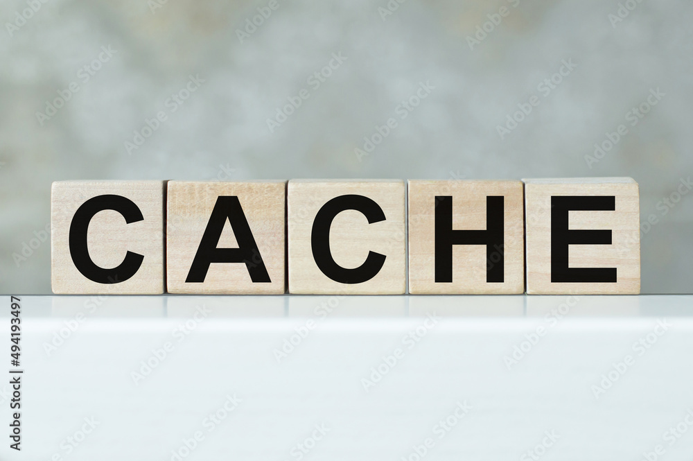 Poster cache word written in wooden cubes on white table isolated