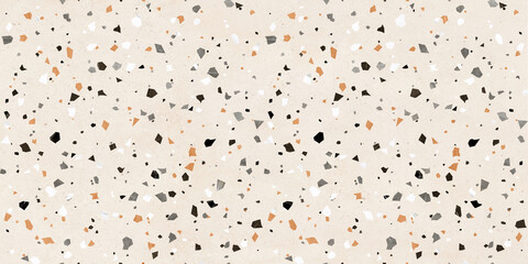 Seamless repeating terrazzo pattern in pastel pink, beige, black and brown. Trendy and stylish composite stone texture, wallpaper, web background, fabric design.