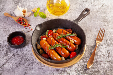 Delicious roasted sausage on wood