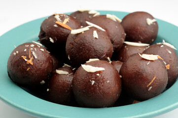Kala Jamun with almond toppings, Indian dessert 