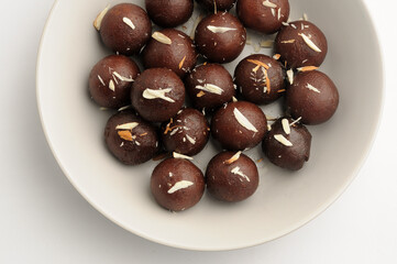 Kala Jamun with almond toppings, Indian dessert 