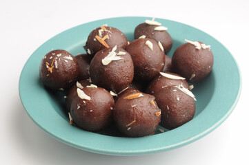 Kala Jamun with almond toppings, Indian dessert 