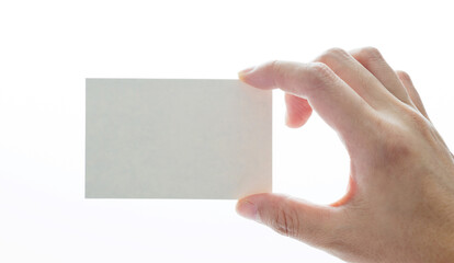 Obraz premium Hand holding blank card isolated on white background
