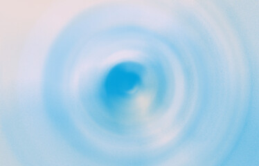 Shiny light blue swirl abstract background. Concentric circles around central point. FlashLight. Designer background. Abstract Background Of Spin Circle Radial Motion Blur