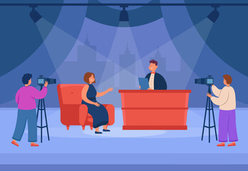 TV talk show with female celebrity flat vector illustration. Woman sitting on sofa and talking with host, discussing news in studio. Videographers filming broadcasting. Television, interview concept