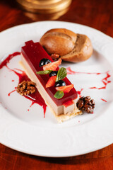 Strawberry dessert with walnuts, berries and bread.