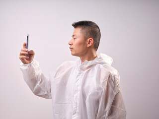 A man in protective clothing ...