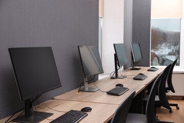 Many modern computers in open space office