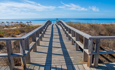 long wooden walk to the beach
