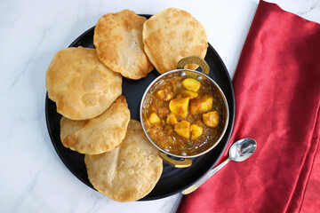  Indian cuisine - Puri Bhaji. It is a traditional breakfast dish in North India. Puri is a deep...