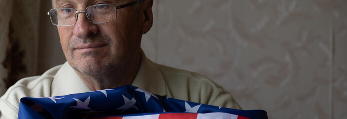Senior man with american flag