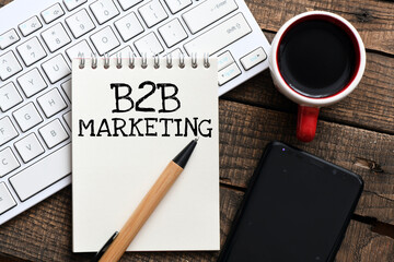 B2B MARKETING words written in an office notebook.