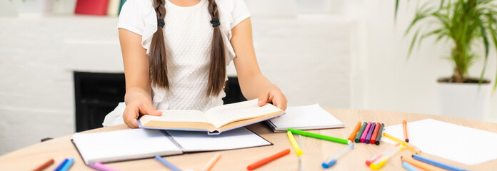 education and school concept - smiling little student girl
