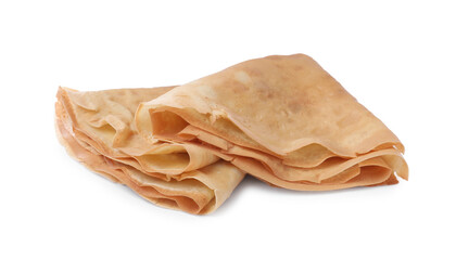 Two delicious folded crepes on white background