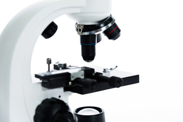 Close-up shot of microscope isolated on white background