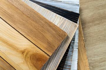 Obraz na płótnie Canvas Stack of various construction sample wood boards.