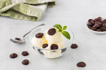 Vanilla ice cream with mini chocolate brownie cookies.