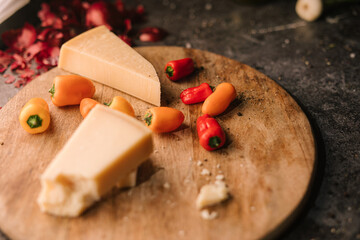 Delicious Cheese on Wooden Cutting Board