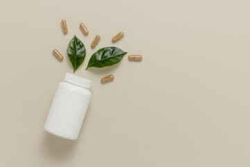 Top view mockup bottle for pills and vitamins with green leaves, natural organic bio supplement,...
