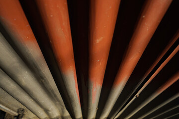Red shiny starburst background. Sunburst abstract texture.