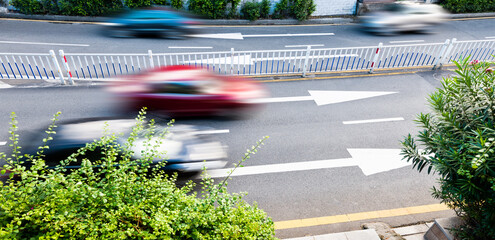 Straight forward arrow direction sign on asphalt ground