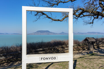 beautiful szaplonczay promenade with lake balaton landscape in Fonyod Hungary with badacsony hill...