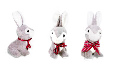 Cute toy bunny on white background