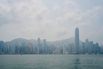 Victoria Harbor in Hong Kong at a misty spring day