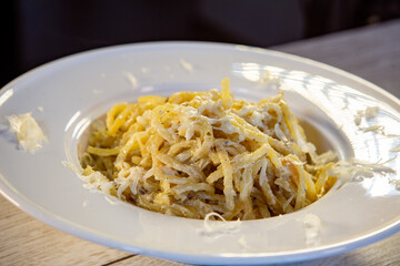 italian pasta served in a hat plate