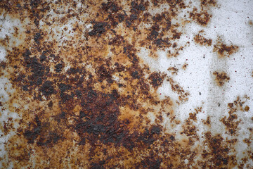 Rusty metal wall, old iron sheet covered with rust