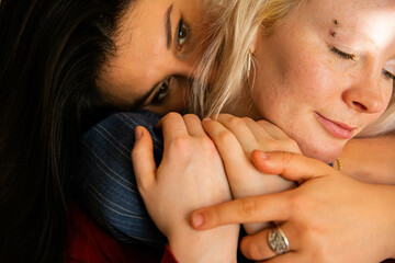 Lesbian couple embracing each other