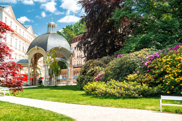 View of Dvorak Park in Karlovy Vary with wooden alcove, Czech Republic