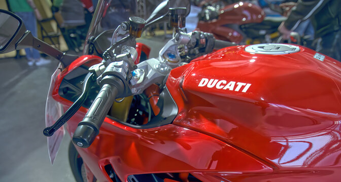 Ducati street bike, red painted fast motorcycle from Italy for sporty riders in Braunschweig, Germany, March 20, 2022