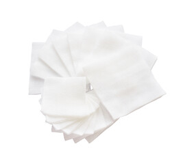 Naklejka premium Pile of big and small size pad gauzes on isolated white background in fan shape