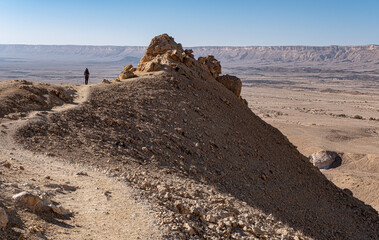 On descent from Mount Ardon with the Ramon Crater below in the background, Mitzpe Ramon, Beer Sheba, Negev Desert, Southern Israel, Israel