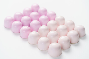 Exclusive handmade chocolate candy painted with pastel colo