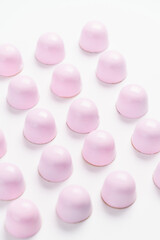 Exclusive handmade chocolate candy painted with pastel colo